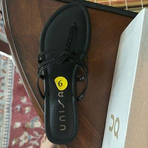 Black sandals with sparkle thong.